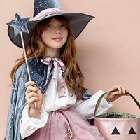 Get ready to cast some spells with magical Mimi & Lula's Beatrix witch wand. The padded star is crafted from soft grey velvet with a metallic silver star print and the stick is wrapped in soft pink satin ribbon. A gorgeous, magical accessory for a dressing-up box, pretend play and Halloween fun. Check out the matching dress-up cape, too. Star size: 9 x10cm. Stick size excluding star: 28.5cm.. Suitable for age 3+. British brand Mimi & Lula creates stylish and playful kids' accessories that bring the sparkle and shine back into playtime and daytime. We love the colourful hairclips, bags and fun dress-up goodies.