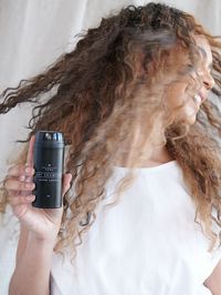 Our natural dry shampoo for dark hair absorbs oil while adding texture and volume with ingredients like arrowroot powder, kaolin clay and essential oils.