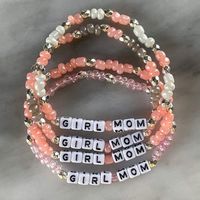 "This hand-crafted elastic stretch word bracelet is the perfect gift for moms-to-be of a little girl! Each bracelet is made-to-order, so any changes regarding size, color, or even word customization can easily be made (please specify these changes in notes or message me directly). Reborn Rebel bracelets are a fun way to carry your favorite words or messages with you throughout your day. Each order includes a free sticker and arrives quickly in fun packaging! If you like this bracelet, but are lo