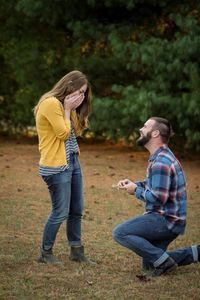 When the photographer suggested an on-one-knee pose, she had no idea it was a proposal!