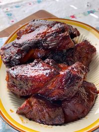 oven baked country style ribs on plate with barbecue sauce