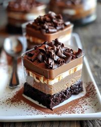 Ingredients: 1 cup flour, 1 cup sugar, 1/2 cup cocoa, 1 tsp soda, 1/2 tsp powder, 1/2 tsp salt, 1/2 cup buttermilk, 1/2 cup coffee, 1/4 cup oil, 2 eggs, 1 tsp extract Directions: 1. Make cake, 2. Make coffee caramel, 3. Make chocolate mousse, 4. Assemble cakes, 5. Serve and enjoy! #CoffeeCaramel #ChocolateMousse #DessertRecipe #SweetTreats