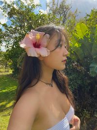 flower in hair, island girl aesthetic