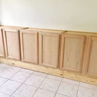 We wanted to add storage cabinets to our home office, but didn't have time to construct the cabinets from scratch. Instead we opted for stock unfinished kitchen cabinets from our local home improvement store and it was perfect. We measured the space and found that we would need three cabinets,. We also found that because there are windows on one adjoining wall, we would need to use upper kitchen cabinets. First step was to remove the baseboards and we would use them later. We want…