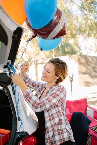 Tailgating Party Guide: Help friends find you by tying helium balloons in your team’s colors to your antenna or roof rack and/or flying your team’s flag using a flagpole kit. Set out folding chairs and a table and decorate with team pennants and other team paraphernalia. Then put your tailgate down (assuming you have a pickup, SUV or station wagon, that is) and have a ball!