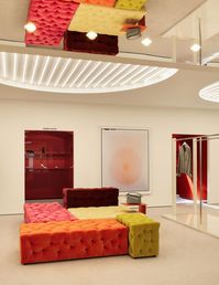 Seating units by Gaetano Pesco add colour to the lower-ground floor space.