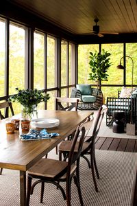 Expand to Outside - 14 Reasons Southerners Can Be Found on the Porch Year Round - Southernliving. This screened porch runs the entire length of the front of this 1000-square-foot lake home to max out the living space and take advantage of the water views. The owner opted to keep the paint dark (Benjamin Moore’s Bronzetone) and keep the focus on the foliage outdoors.