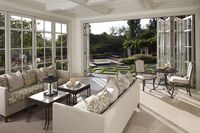 Are you kidding me? This is amazing, sun porch with bi-fold doors...Not to mention the amazing flagstone stepping stones!! LOVE