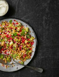 A vibrant, nourishing salad made super colourful with pomegranate seeds, red onion, cucumber nuggets and coriander. There are lentils in there for added protein, too