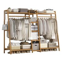 PRICES MAY VARY. Sturdy & Durable Entryway Rack: This 9-Tier garment rack is made of high-quality bamboo, featured by its strong toughness and higher compressive strength; fine polished with varnish, which keeps its natural texture and aesthetically pleasing to the eye. Aesthetic & Minimalism Design: This stylish bamboo garment rack will keep all your stuffs organized; trapezoid-structure with two hanging rod, two hooks and 9-tier storage shelves gives you plenty of space to store seasonal wardr