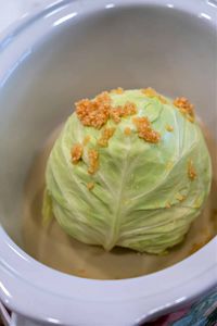 If you haven't made a whole head of cabbage in slow cooker it's so easy! Gets it tender to the core in just a few hours. Healthy side dish.