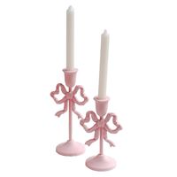 PRICES MAY VARY. SIZE - S:4.7inch×3.5inch×8inch, L:4.7inch×3.5inch×10inch. Suitable for 2cm/0.78inch candles and led taper candles. Candles not included. EXQUISITE DESIGN - Elegant bow design, exquisite workmanship, giving a romantic and generous feeling.Elegant for the home life to add a noble atmosphere. HIGH MATERIAL - Our skilled artisans use high quality metal to create each elegant taper candle holder with a trace of shabby chic style.Their bow shape and texture illustrate the true beauty of forged iron. Heavy and stable MULTI-OCCASIONAL PINK CANDLE STAND - Add these to your mantle, bedroom, living space or dining room for a bold and beautiful accent.Our tall candle holder decor is perfect for table party, weddings and home decorations. This set of candlesticks holder is great additi