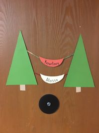 tree and kayak door dec by Cody Laman @ Housing and Residence Life at University of MN Duluth