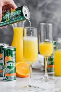 This Non Alcoholic Mimosa recipe or Mimosa Mocktail is the perfect brunch drink when you are trying to cut back on calories and lighten things up.  Made with just a few ingredients, this mimosa is going to shock you with how delicious and refreshing it is!