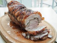 Porchetta is a classic Italian pork roast, great in sandwiches. Left to infuse with herbs, fennel and salt overnight, the flavor is delicious, the fat crisp.