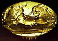 Gold ring w/a bull-leaping scene from Phourni. Before 2000 BC