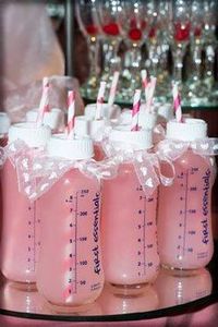 Pink lemonade in baby bottle with striped straws for a baby shower. Or blue powerade for a boy. Or use both for a gender revealing party.