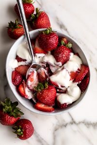 Sliced, juicy, ripe strawberries are smothered in cream topped off with a little sugar. I like to lightly beat my cream by hand so it’s a little fluffier and add just a touch of Grand Marnier liqueur to amp up the flavor.