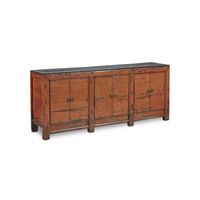 This antique piece, the Bittersweet Sideboard, is one of our curated items, a true antique from Asia, that we rehabilitated to make it sturdy and usable. We applied a stunning bittersweet-orange finish, then rubbed on a black finish to further age it. Each set of cabinets has an interior shelf, though sizes will vary f