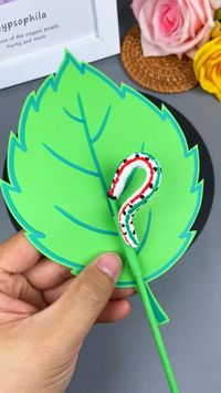 "Transform simple materials into a playful craft! 🌿 This DIY caterpillar on a leaf is perfect for kids' projects or fun decor. 🐛✨ #PaperCrafting #DIYFun"  **Hashtags:**   #CraftIdeas #EasyDIY #PaperArt #KidsCrafts #DIYProjects #CreativeCrafts #HandmadeDecor #CraftTutorials