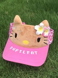 Embrace the cuteness and functionality with our Kitty Sun Protection Cap, featuring an adorable color block design. This unique cap is crafted to resemble a charming kitty, making it a perfect accessory for your kawaii wardrobe. The cap's brim is a delightful shade of pink, adorned with a trendy letter-knit pattern, adding a touch of playful elegance. What sets this cap apart are the sides, which boast a fun pink leopard print, enhancing its stylish appeal. Whether you're out for a casual day in