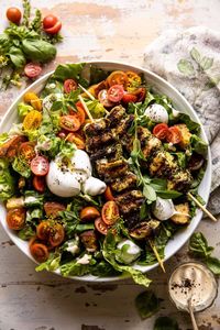 Pesto Chicken Caesar Salad with Tomatoes and Burrata...not your everyday salad. Delicious, easy to throw together, egg-free, colorful, healthy, and filling!