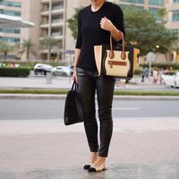 “All black for a working weekend. chanel slingbacks, thekooples leather pants, celine luggage tote, zara sweater” dubai streetstyle Yasmin_dxb instagram