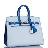 This Special Order Sellier Birkin is in Bleu Brume and Bleu Zellige epsom leather with brushed palladium hardware and has contrast stitching, front flap, two straps with center toggle closure, clochette with lock and two keys, and double rolled handles.The interior is lined with Bleu Zellige chevre and has one zip pocket with an Hermes engraved zipper pull and an open pocket on the opposite side.Collection: UOrigin: FranceCondition: Pristine; new or never (Plastic on hardware)Accompanied by: Hermes box, Hermes dustbag, clochette, lock, two keys, clochette dustbag, felt, rainhat, carebook and ribbonMeasurements: 10" width x 7.5" height x 4.75" depth; 2.75" handle drop