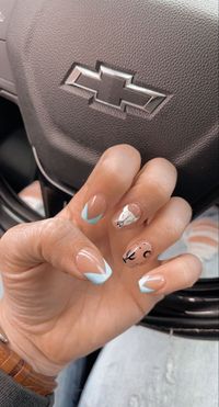 Cowgirl inspired nails evoke a rustic yet chic vibe reminiscent of the Wild West. Imagine cow print designs, horseshoes, cacti, or even miniature cowboy hates for added flair. It's a whole rodeo and we want the entire look.