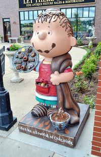 Linus Statue at Candyland in Stillwater, Minnesota, one of the many Peanuts on Parade statues you'll find across the state. This one, featuring Linus Blankets, entitled Life is Like a Bowl Full of Chocolates.