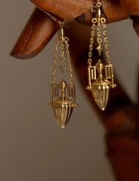 These stunning 18kt gold-plated Egyptian tassel earrings exude a timeless elegance and an exotic allure. The earrings is coated in 18kt gold, providing a rich, warm luster that highlights the elaborate craftsmanship.