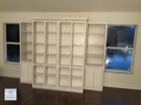 This is certainly a multi-functional bookcase system. There is a Murphy wall bed hidden behind the 4 center bookcases. This is our latest Pivoting Bi-Fold Bookcases and Murphy Wall Bed with Side Cabinets. The Savona wall bed and cabinets are shown in Whitewash on Oak. Contact us to find out more or if you would like to schedule an in-person FREE CONSULTATION either in your home or our showroom in Largo, Florida. 2233 34th Way N Largo, FL 33771 727-522-2700 sales@accentwoodworking.com