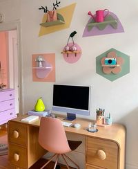 This desk is like a treasure trove of creativity! It's all set up with colorful craft supplies, just waiting for you to bring your artistic ideas to life. It looks like the perfect spot for some crafting magic!