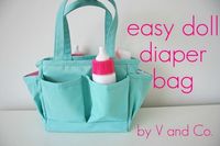 tutorial for doll stuff -genius diaper bag idea...a scrapbook supplies tote! I see those at the thrift store from time to time.