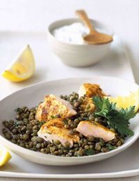 Try this interesting twist on classic grilled salmon. Spiced with garam masala and served with garlic and lemon Puy lentils, this is a healthy mid-week supper.