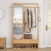 The solid wood coat rack is equipped with a reversible full-length mirror. You can admire your perfect dress just by turning around. It also provides space for neatly storing shoes. It is equipped with a thick solid wood clothes hanging rod so that you can conveniently Hang up coats, scarves.