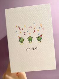 YIP-PEA is the perfect card to celebrate with, it is perfect for any celebratory occasion and is blank inside for you own message!  This is a high quality printed card, the paper used is Tintoretto Gesso. The 'hammered' texture of Tintoretto is strangely satisfying to touch! It has a luxurious feel and is easy to write on. The card comes accompanied with a brown 'Kraft' envelope. My logo and details are printed on the back. Paper size - A6 (148mm x 105mm) This is a print of my original watercolour illustration.