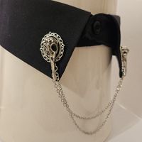 Classic and elegant silver-tone collar pin with a double chain, featuring a raven skull in a frame.  Makes any shirt absolutely dashing. I will send you a free charm with every order! Handmade with care in Montreal.