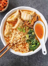 11 reviews · 20 minutes · Serves 1 · A warm and hearty bowl of Kimchi Noodle Soup with Dumplings! Noodles in a flavourful, umami kimchi broth with mushrooms, dumplings, and veggies. This is one of that really easy one-pots… More by The Foodie Takes Flight | Vegan Asian Recipes