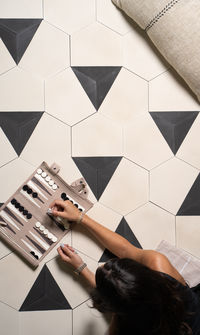 Hex Black Caret Hexagon Encaustic Cement Tile is an exclusive handmade encaustic cement tile suitable for walls, floors, indoors, outdoors and wet areas.