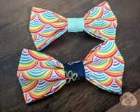 Welcome to LoveNalaBoutique! 🐾  Celebrate love and diversity with our vibrant LGBTQ Pride Bow Tie collection! Handcrafted with care, these bow ties feature bold, colorful designs that showcase the spirit of unity and inclusivity. Each one is made from high-quality, durable materials, ensuring they are perfect for every adventure, whether it's a party, a park day, or simply showing off your pride. Ideal for proud pet parents who want to share their love and support, our LGBTQ Pride Bow Tie collection is a perfect way to let your furry friend join in the celebration. Show your true colors and spread the love with our stunning pride bow ties! 🌈🐾 LINKS TO TOHER STYLES🌞 https://lovenalaboutique.etsy.com/listing/1708928423/peace-signs-and-paw-prints-reversible MATCHING KEYCHAINS: https://www