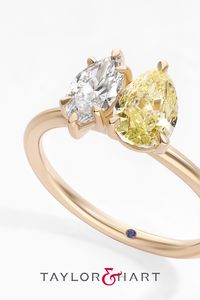 Yellow gold toi et moi engagement ring set with a white diamond marquise and yellow diamond pear #toietmoi #yellowdiamond #whitediamond #marquise #pear