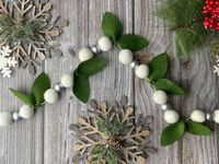 This unique garland is hand-made with 100% wool making it the perfect decoration for your home, office or parties. Our Garlands are completely non-synthetic, eco-friendly, and biodegradable. Proudly made in Canada by Woman own business. Details Our products are handmade with the highest quality 100% merino wool from New Zealand. Each of the balls is sewn on the twine but there are no knots holding the felt ball in place. That allows you to customize the position of your felt balls with a gentle