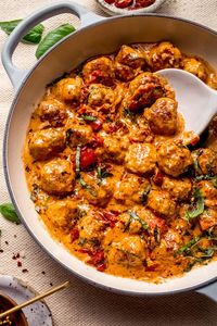 This Marry Me Meatballs recipe surrounds Italian-seasoned chicken meatballs in a heavenly sun-dried tomato cream sauce. Perfect for date nights, family dinners, and dinner parties!