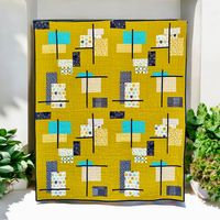 This is a unique and one of a kind quilt. I love the retro feel, and I guess it is, the pattern is from 2011. Some designs never go out of style. I decided to use an equally retro fabric line from 2015 for the focus fabrics. The background is hard to capture but the color is Pickle. It measures approximately 57x68 inches after washing, a generous size for cuddling on the couch, a bed topper, or a small twin. My quilts are made to be used and loved.  Great passion and joy goes into each and every quilt from ShaSha LaRue and only the finest fabrics and warm, natural cotton batting are used.  The quilts are machine pieced and quilted to achieve a classic, timeless look and are crafted in a non-smoking, pet free environment. Care and Details: All quilts are pre-washed and dried so there should