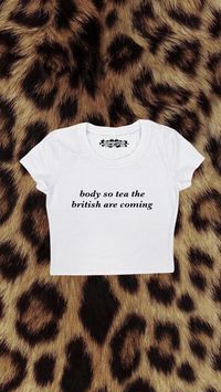 Crop top with "Body So Tea The British Are Coming" design printed on a 95% cotton 5% spandex, form fitting, available in multiple colors 💞 Make sure to check the size chart!✨ Message me with any questions :)  we do not give refunds for incorrect addresses so please double check that all your information is correct before ordering