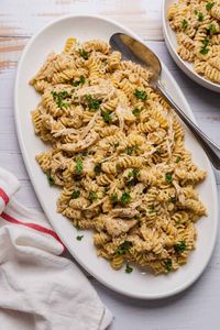 Crockpot Garlic Parmesan Chicken Pasta is a hearty slow cooker dish that's perfect when you need an easy dinner recipe. Crockpot garlic parmesan chicken pasta can be made with basic ingredients like chicken breasts, cream cheese, milk, parmesan cheese, and parmesan garlic sauce.rn