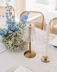 The Wedding Shed on Instagram: "4 reasons why we love that table lamps have entered the wedding world..   They create a warm and intimate atmosphere, focusing soft light downwards onto your table settings and your meals, ensuring your guests are comfortable and able to see what they are eating whilst maintaining a sophisticated, muted atmosphere.   Large overhead lighting installations, whilst spectacular, can be very costly and if you opt for the cheaper option, can often throw a really yellow light throughout the space. Table lamps emit softer, more flattering light, which is ideal for photographs and creating a cozy ambiance and are often a much more cost effective option.   Whilst an abundance of candles can be beautiful, they are often very difficult from a functional perspective. Req