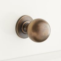 Signature Hardware 946678-1 Rodino Round Cabinet Knob Signature Hardware 946678-1 Features:Solid Brass construction ensures a durable and lasting productCovered under Signature Hardware's 10 year limited warrantyMounting Hardware included for easy installationSignature Hardware 946678-1 Specifications:Projection: 1-3/8"Material: Brass Round Antique Brass