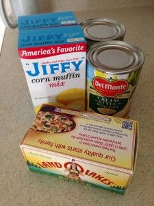 canned food items are sitting on the counter top next to boxes and containers for soup